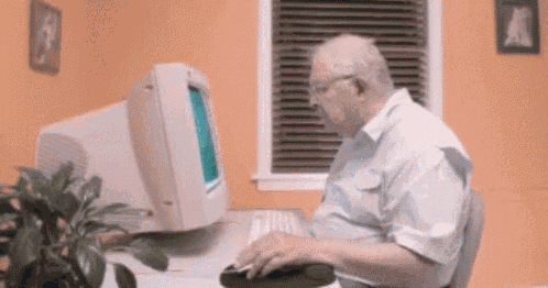 Old man using computer